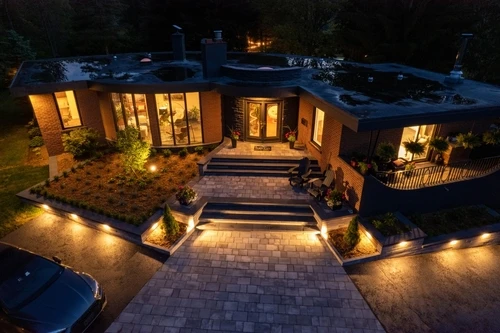 residential property with modern outdoor lighting designed to enhance curb appeal